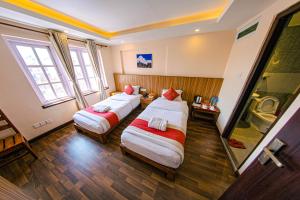 Voodi või voodid majutusasutuse Hotel Chhimeki toas