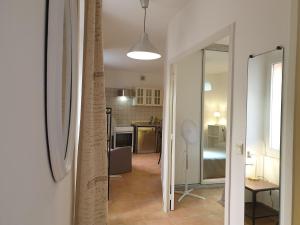 Kuchyň nebo kuchyňský kout v ubytování Appartements de l'Eglise