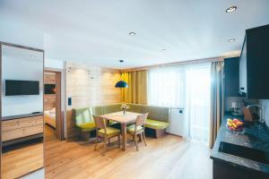 TV a/nebo společenská místnost v ubytování das Luggi Appartements