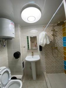 Ванная комната в Коворкинг-резорт ololoAkJol