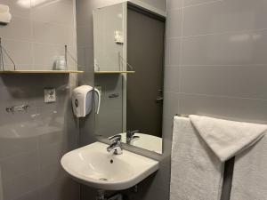 Koupelna v ubytování Fjellfolkets Hus + 11 fotografií