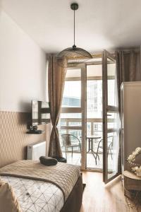 Posteľ alebo postele v izbe v ubytovaní ClickTheFlat Gdański Center Prestige Apart Rooms