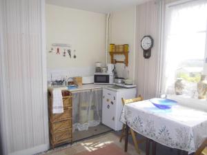 Kuchyň nebo kuchyňský kout v ubytování Lenard Charles Bed & Breakfast