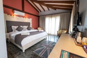 A bed or beds in a room at Ölüdeniz Loft - Adults Only