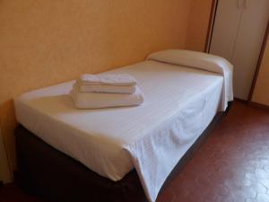 Postel nebo postele na pokoji v ubytování Hotel Liberty