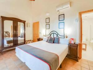 Łóżko lub łóżka w pokoju w obiekcie Hotel Torre San Juan