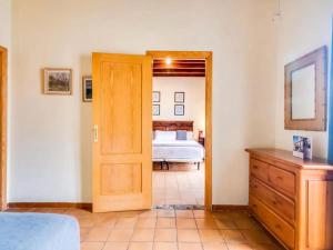 Łóżko lub łóżka w pokoju w obiekcie Hotel Torre San Juan