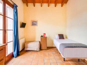 Łóżko lub łóżka w pokoju w obiekcie Hotel Torre San Juan