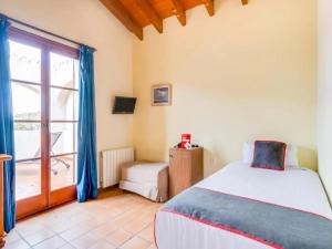 Łóżko lub łóżka w pokoju w obiekcie Hotel Torre San Juan