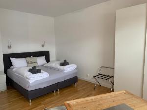 a bedroom with two beds in a room at Hotel Prinz Carl in Neckarsulm