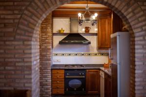 Kuchyňa alebo kuchynka v ubytovaní Villa española, Casa del Nene