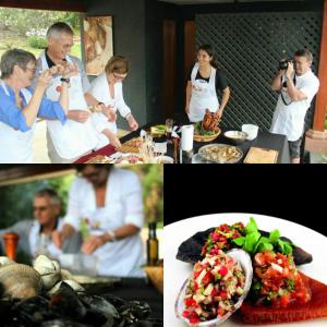 a group of people in a kitchen preparing food at La Casa de la Nueva Poesía in Santo Domingo