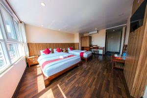 Voodi või voodid majutusasutuse Hotel Chhimeki toas