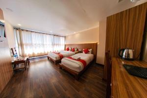 Voodi või voodid majutusasutuse Hotel Chhimeki toas