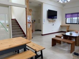 TV a/nebo společenská místnost v ubytování Yuan Homestay
