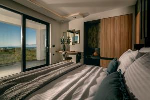 Foto dalla galleria di Vatia Villas a Tragaki Altre 52 foto