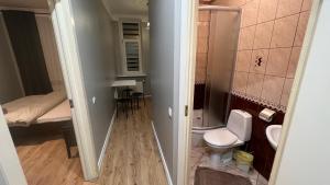 Koupelna v ubytování ApartHotel Riga