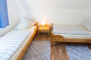 Ein Bett oder Betten in einem Zimmer der Unterkunft Ferienhaus Seestern
