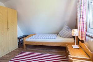 Ein Bett oder Betten in einem Zimmer der Unterkunft Ferienhaus Seestern