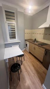 Kuchyň nebo kuchyňský kout v ubytování ApartHotel Riga