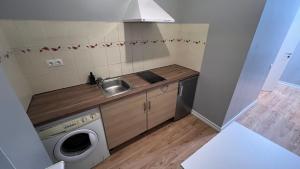 Kuchyň nebo kuchyňský kout v ubytování ApartHotel Riga