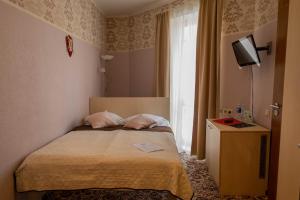 Postel nebo postele na pokoji v ubytování Hotel Pils with Self-Check in