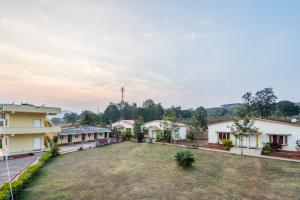 a view of the courtyard of a school building at At Home Prakruthi Resorts in Araku