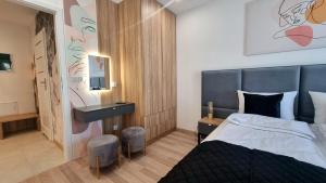 Un pat sau paturi într-o cameră la NOOK NOOK Apartments Bytkowska 103
