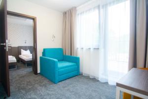 Łóżko lub łóżka w pokoju w obiekcie Lifestyle Hotel Leithana
