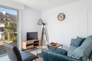 Et tv og/eller underholdning på À moins de 300m de la mer, maison cosy pour 4