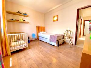 Postel nebo postele na pokoji v ubytování Villa Ágatha, vacaciones en familia en Lanzarote