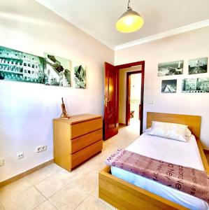 Postel nebo postele na pokoji v ubytování Villa Ágatha, vacaciones en familia en Lanzarote