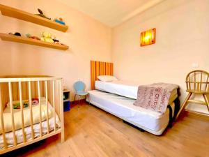 Postel nebo postele na pokoji v ubytování Villa Ágatha, vacaciones en familia en Lanzarote