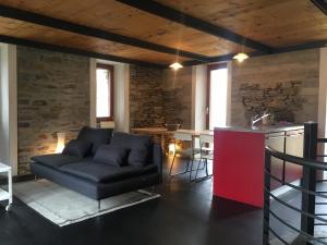 Uma área de estar em RUSTICO Orabino & SAUNA