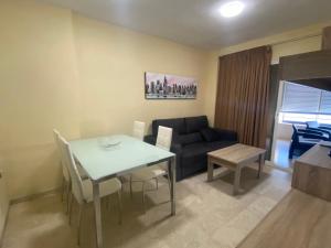 A seating area at Apartments Torre Levante 1H