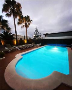 Bazén v ubytování Villa Ágatha, vacaciones en familia en Lanzarote nebo v jeho okolí