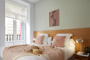 Een bed of bedden in een kamer bij Mayor Suite 1 by FeelFree Rentals