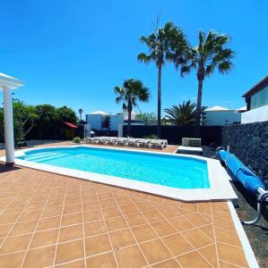Bazén v ubytování Villa Ágatha, vacaciones en familia en Lanzarote nebo v jeho okolí