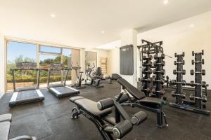 Фитнес-центр и/или тренажеры в Caneiros Luxury House & Suites