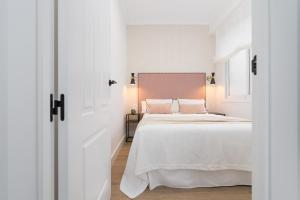 Posteľ alebo postele v izbe v ubytovaní iloftmalaga SoHo - Calle Martínez Campos