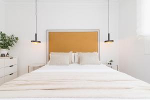 Posteľ alebo postele v izbe v ubytovaní iloftmalaga SoHo - Calle Martínez Campos