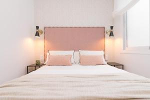 Posteľ alebo postele v izbe v ubytovaní iloftmalaga SoHo - Calle Martínez Campos