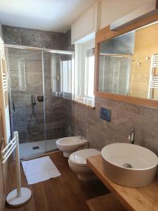 Koupelna v ubytování Regina delle Alpi