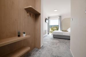Postel nebo postele na pokoji v ubytování Hotel Villa Nova