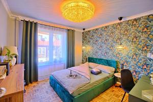 Katil atau katil-katil dalam bilik di Apartament Lipova +4 gambar