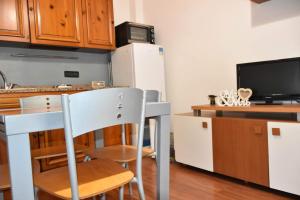 Η κουζίνα ή μικρή κουζίνα στο Casa Lulù +2 φωτογραφίες