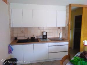 Kuchyň nebo kuchyňský kout v ubytování Appartement cosy avec vue sur la mer à Camiers - 46 m²