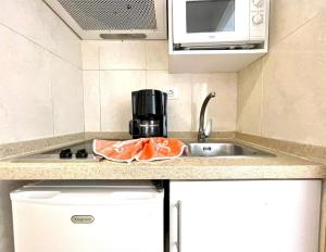Una cocina o zona de cocina en Hotel Casa del Sol