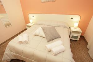 Postel nebo postele na pokoji v ubytování B&B San Domenico