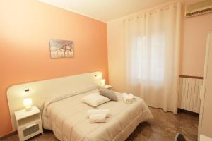 Postel nebo postele na pokoji v ubytování B&B San Domenico